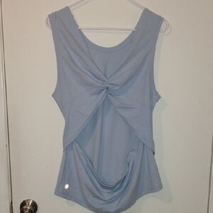 lululemon athletica Nulu Back Twist Yoga Tank Top. Blue Linen in color. Womens.